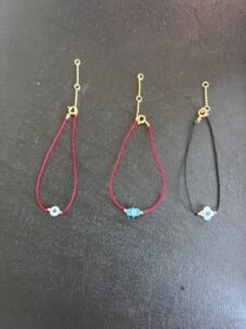 Hamsa bracelet evil eye red cord black cord protection Jewish jewelry